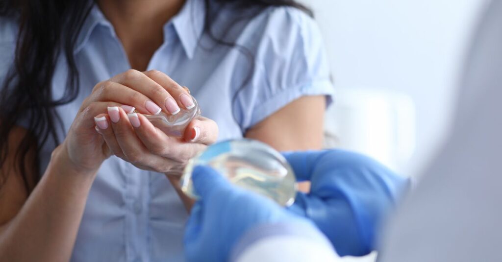Plastic surgeon with implant